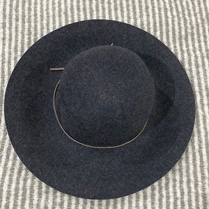 100% wool hat with leather trim.